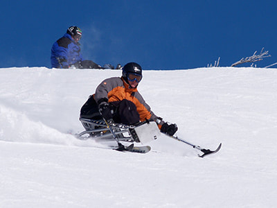 Keith seen adaptive skiing on the mountain.